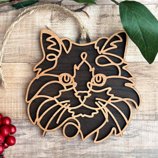 Ragdoll line art cat ornament laser cut from natural wood, minimalist feline silhouette design