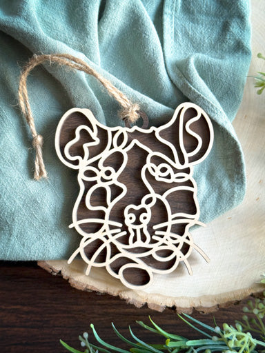 rat line art ornament laser cut from natural wood in continuous line style