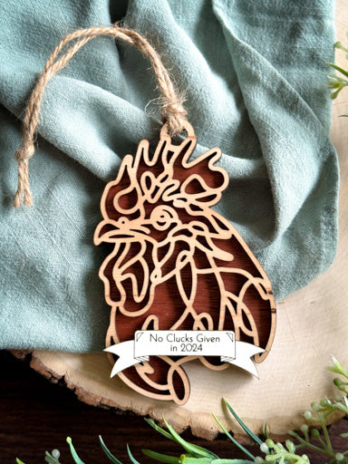 rooster line art ornament laser cut from natural wood in continuous line style