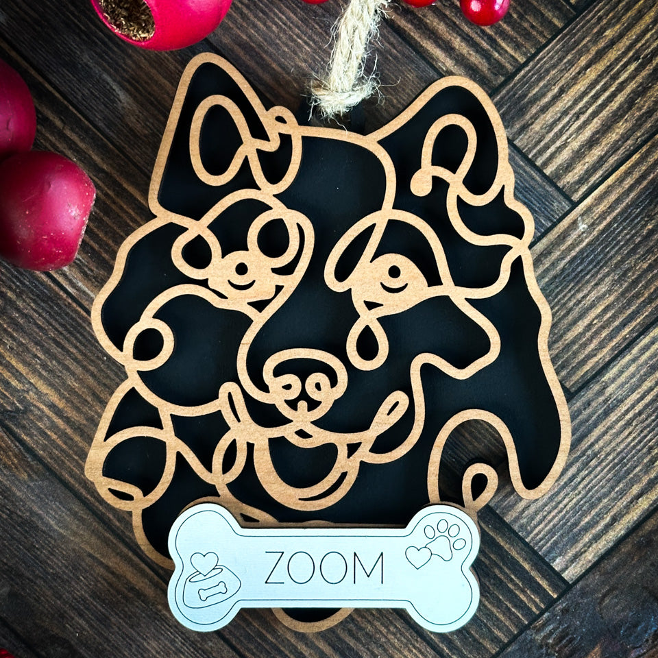 Samoyed line art dog ornament laser cut from natural wood.
