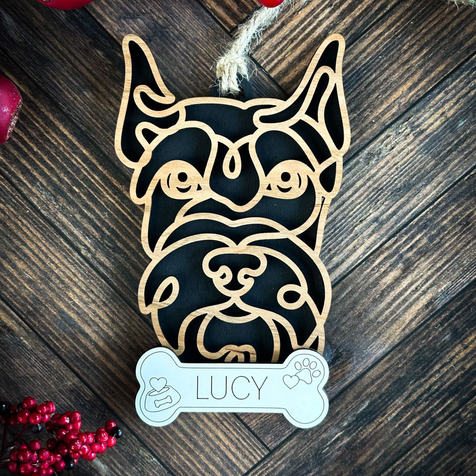 Schnauzer Cropped line art dog ornament laser cut from natural wood.