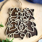 Sheltie Tipped Ears line art dog ornament laser cut from natural wood.