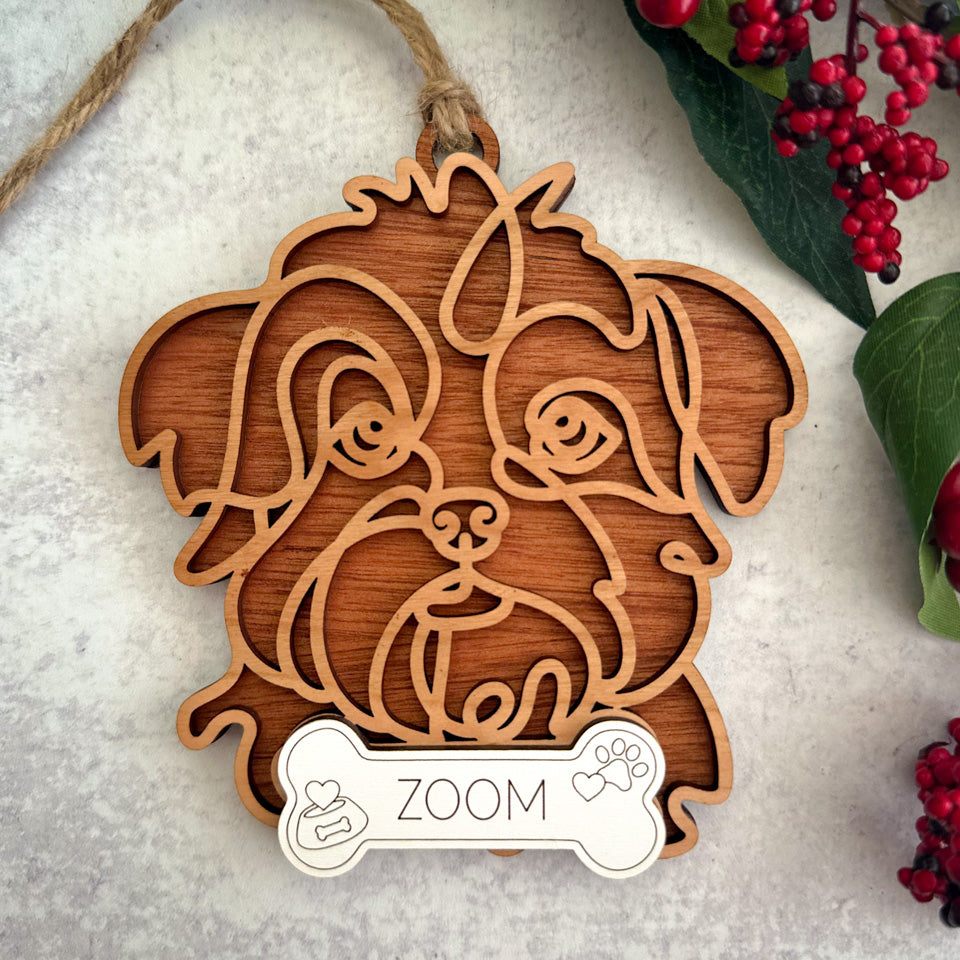 Shih Tzu line art dog ornament laser cut from natural wood.
