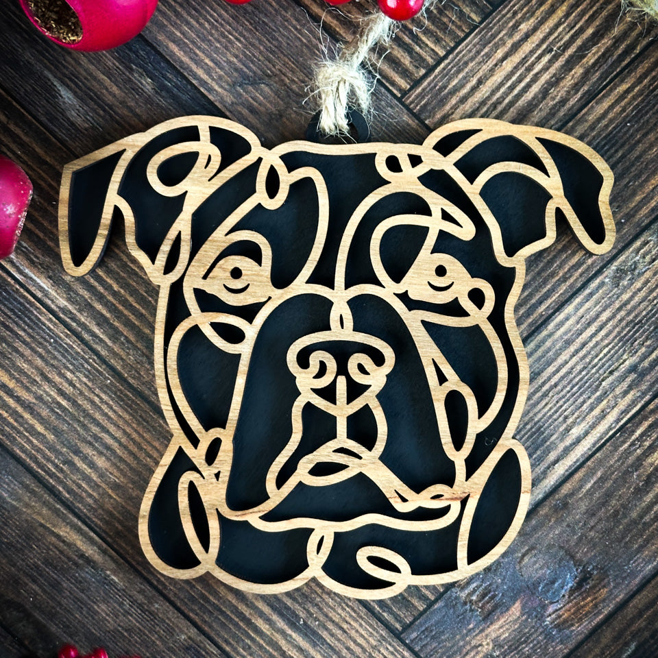 Staffordshire Bull Terrier line art dog ornament laser cut from natural wood.
