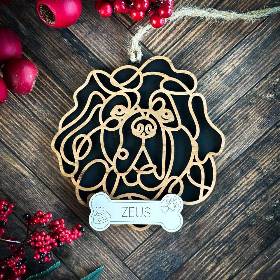 Tibetan Mastiff line art dog ornament laser cut from natural wood.