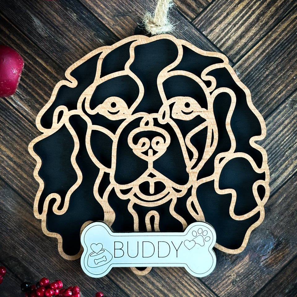 Tibetan Spaniel line art dog ornament laser cut from natural wood.