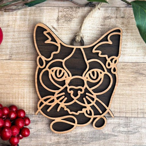 Tonkinese line art cat ornament laser cut from natural wood, minimalist feline silhouette design