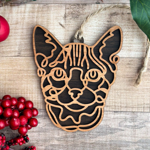 Toyger line art cat ornament laser cut from natural wood, minimalist feline silhouette design