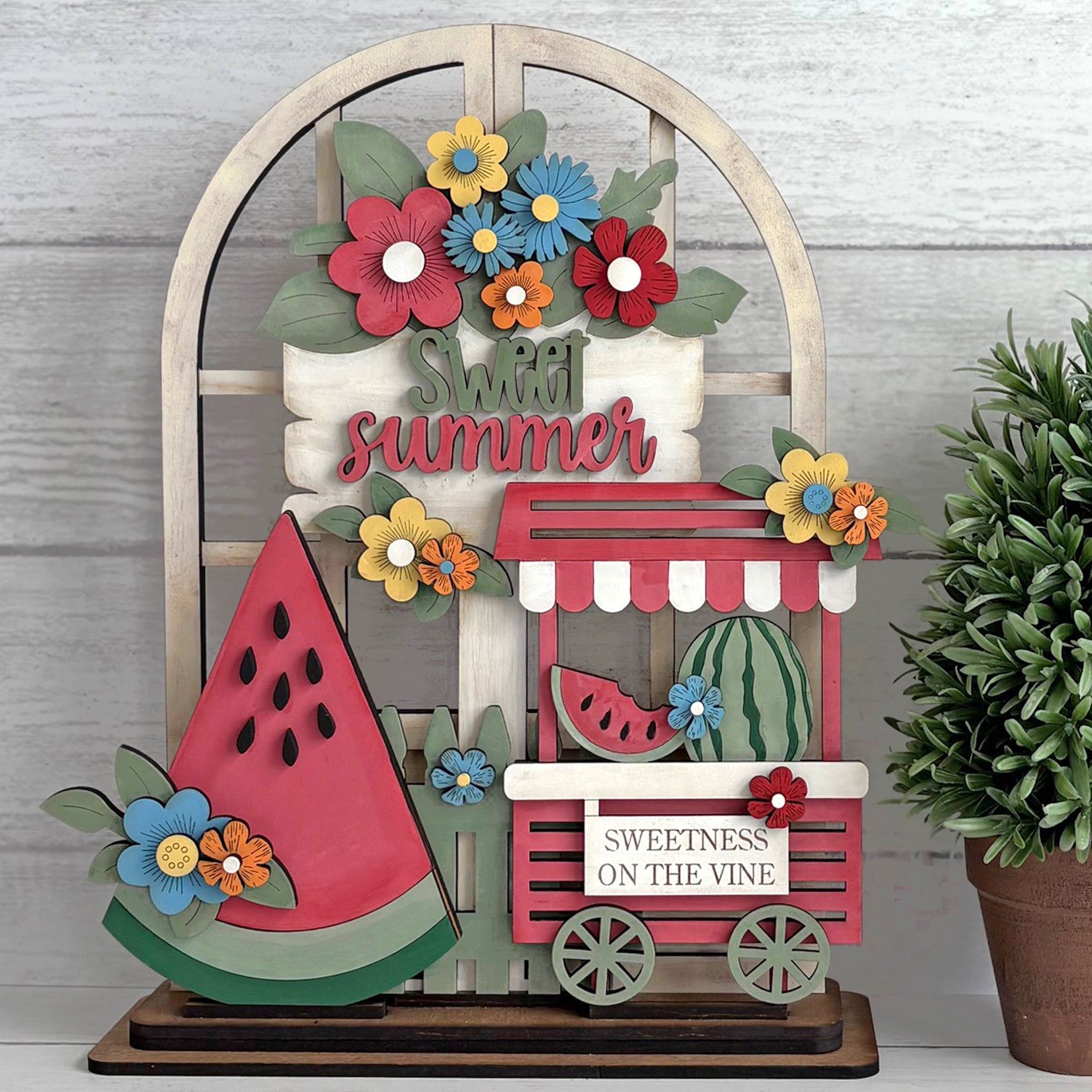 Arched Door insert with watermelon slice, cart and Sweet Summer signage.