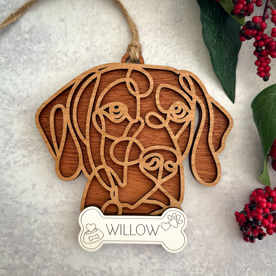 Weimaraner line art dog ornament laser cut from natural wood.