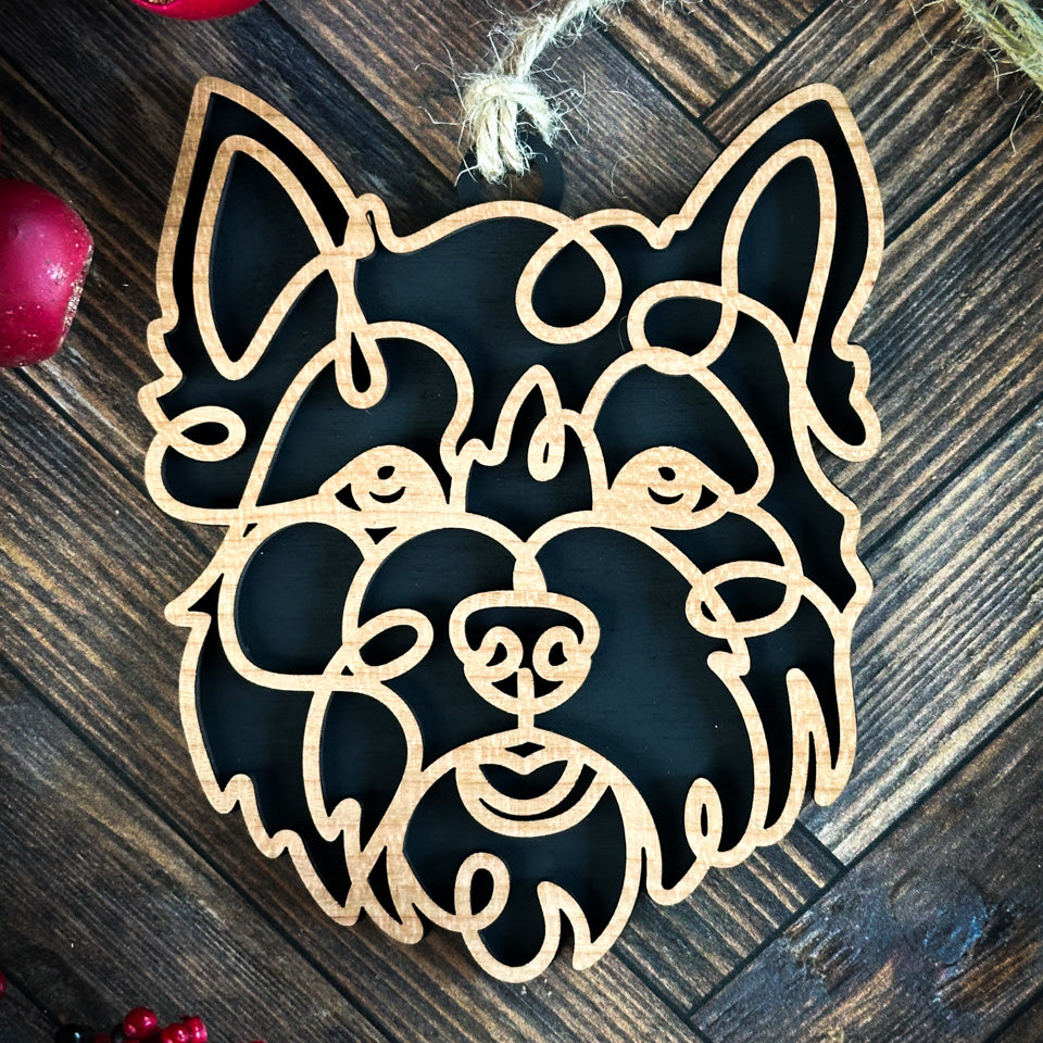West Highland Terrier line art dog ornament laser cut from natural wood.