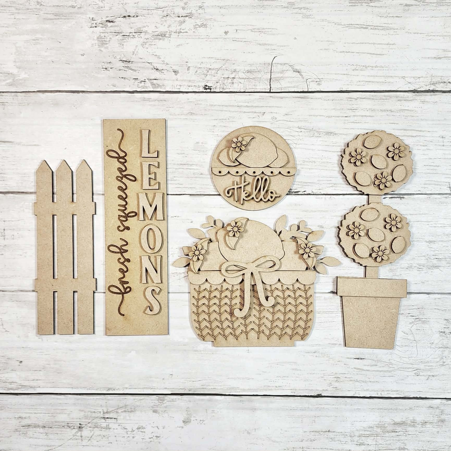 Set of wooden decorative pieces on a wooden surface